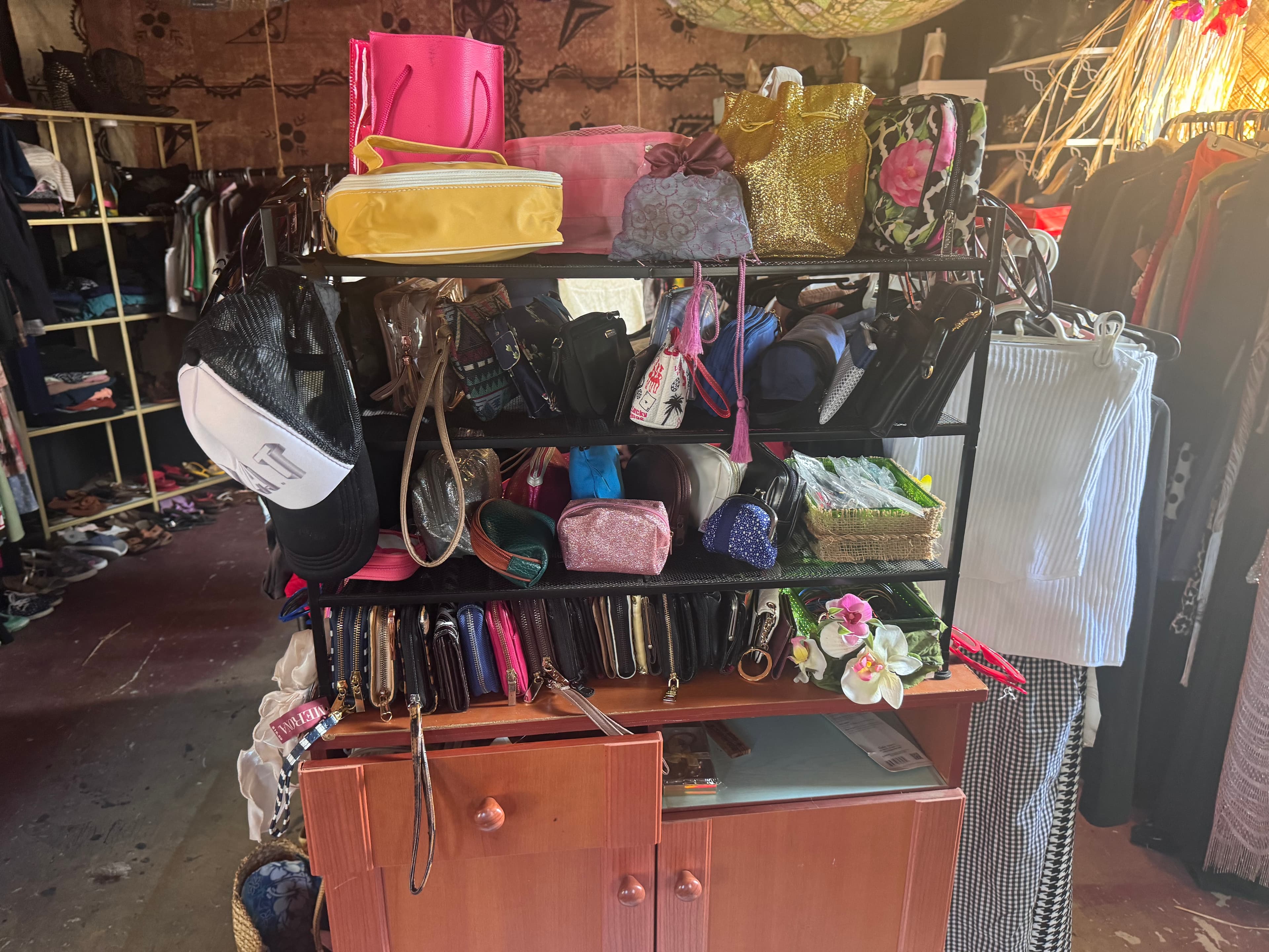Purse rack at thrift shop
